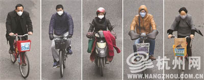延安路，骑车人戴着口罩。